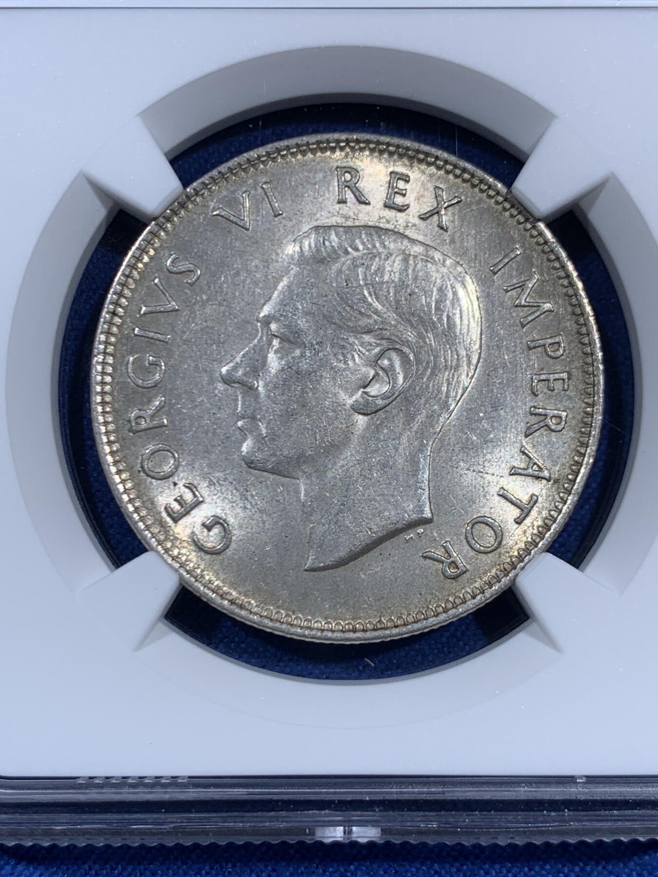 《竞宝斋》第460场 周日，周一，2场连拍 （全场包邮）欢迎送拍 NGC MS63 名誉品英属南非1942年半克朗银币，稀奇首拍MS63的分数 很难遇到的品种