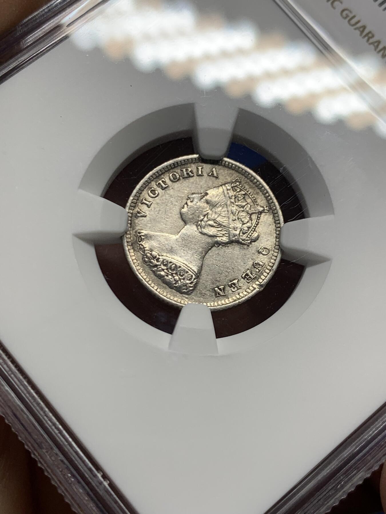 《竞宝斋》第460场 周日，周一，2场连拍 （全场包邮）欢迎送拍 NGC AUD 香港 1887年 维多利亚 一毫 银币 人像清晰 自然包浆 市面多残损币