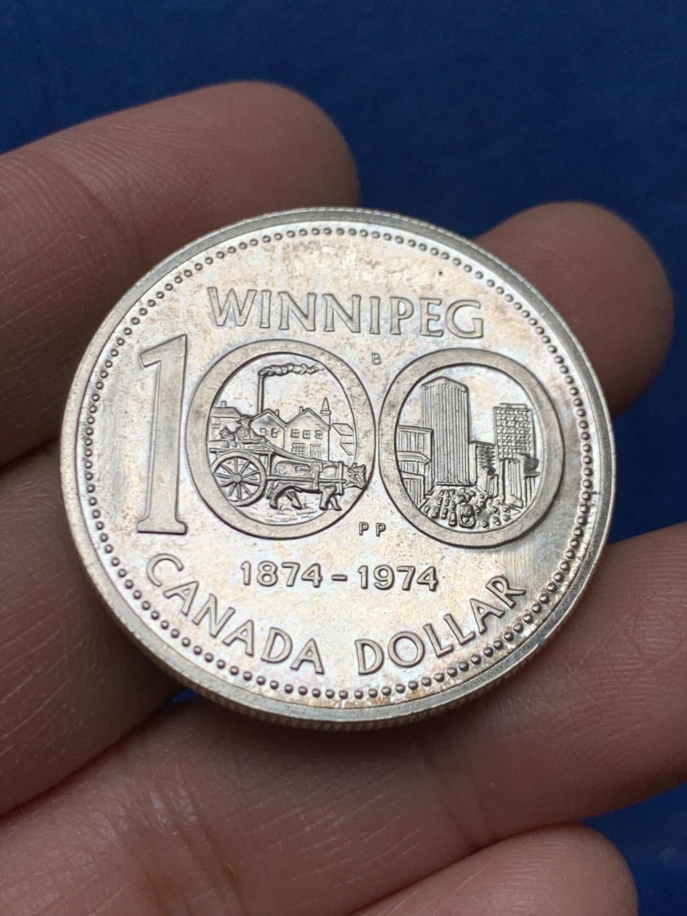 《竞宝斋》第460场 周日，周一，2场连拍 （全场包邮）欢迎送拍 加拿大1974年1元银币，温尼伯建市100周年纪念，23.26克，500银