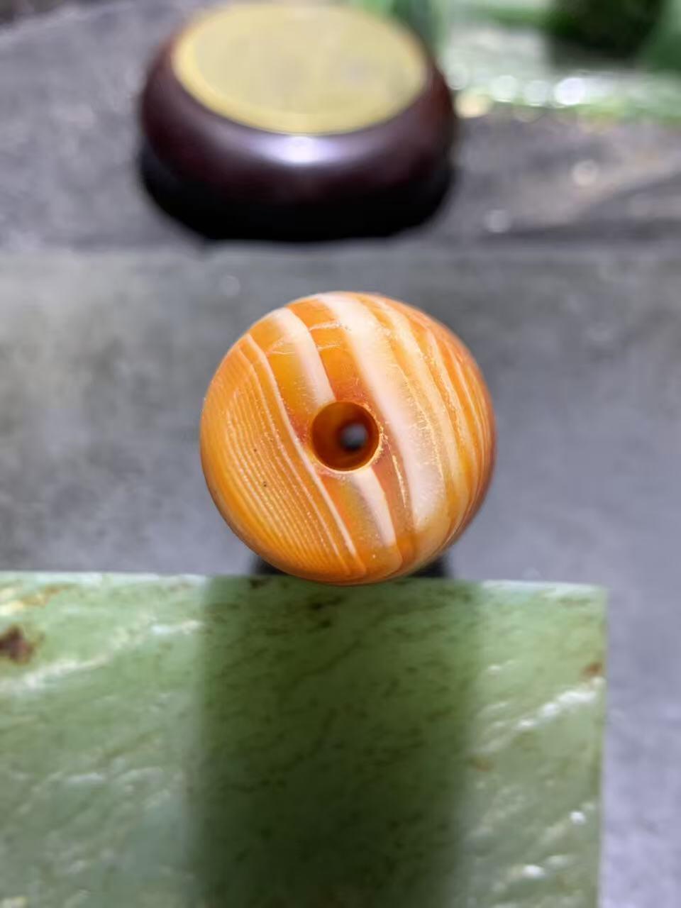 巨无霸天眼风化纹缠丝玛瑙大桶珠（把件)一颗