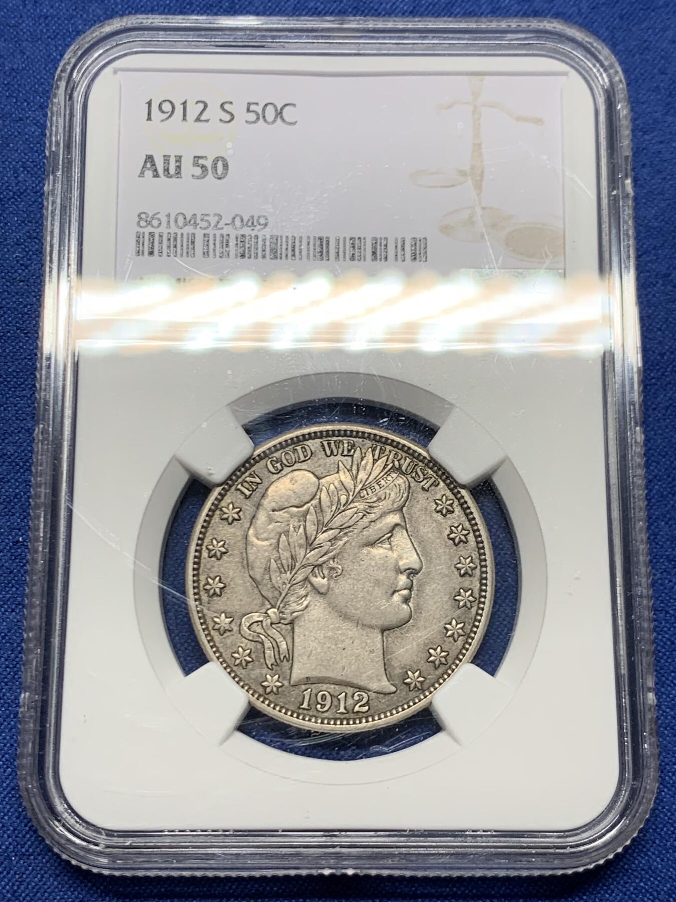 《竞宝斋》第460场 周日，周一，2场连拍 （全场包邮）欢迎送拍 NGC AU50 小特年美国1912-S巴伯五十美分银币，NGC指导价格400美元，合人民币2800元，HA的成交价基本维持在350刀+，国内难得一见的东西