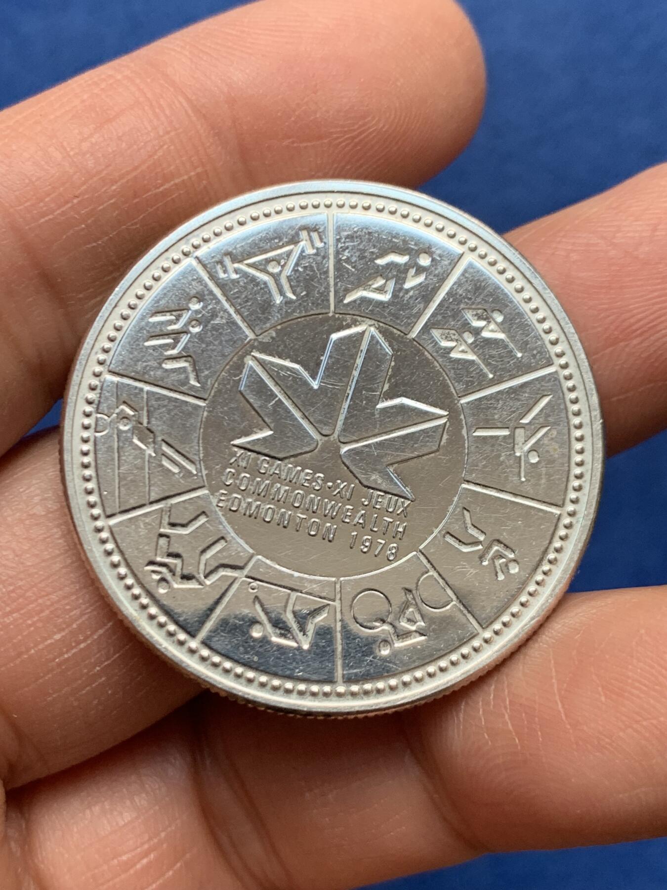 《竞宝斋》第460场 周日，周一，2场连拍 （全场包邮）欢迎送拍 加拿大1978年埃德蒙顿英联邦运动会1元银币，23.7克，500银