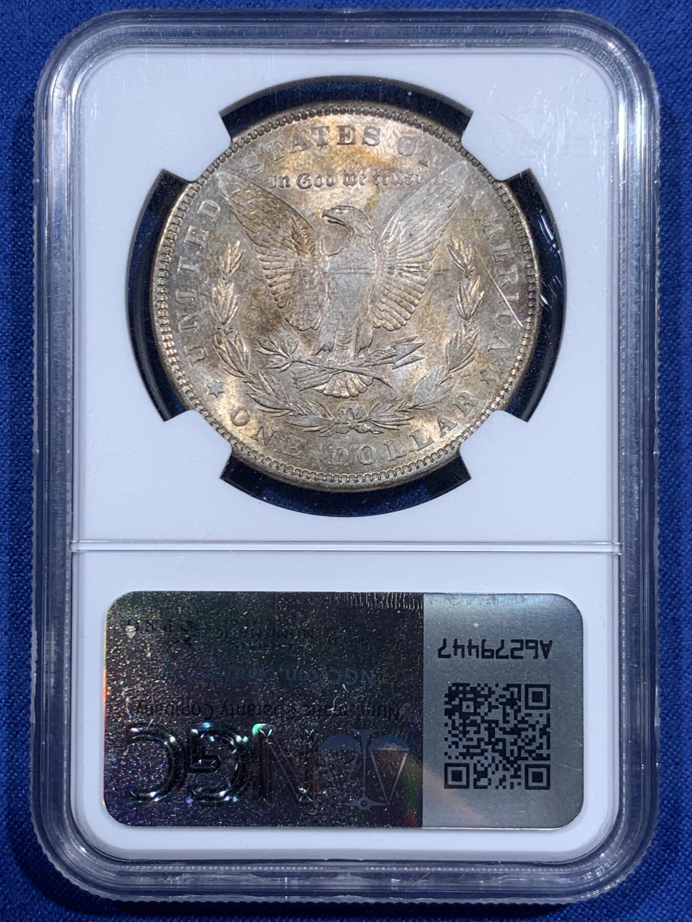 《竞宝斋》第460场 周日，周一，2场连拍 （全场包邮）欢迎送拍 NGC UNC 美国1890年摩根银币，淡金彩，略少见的年份。