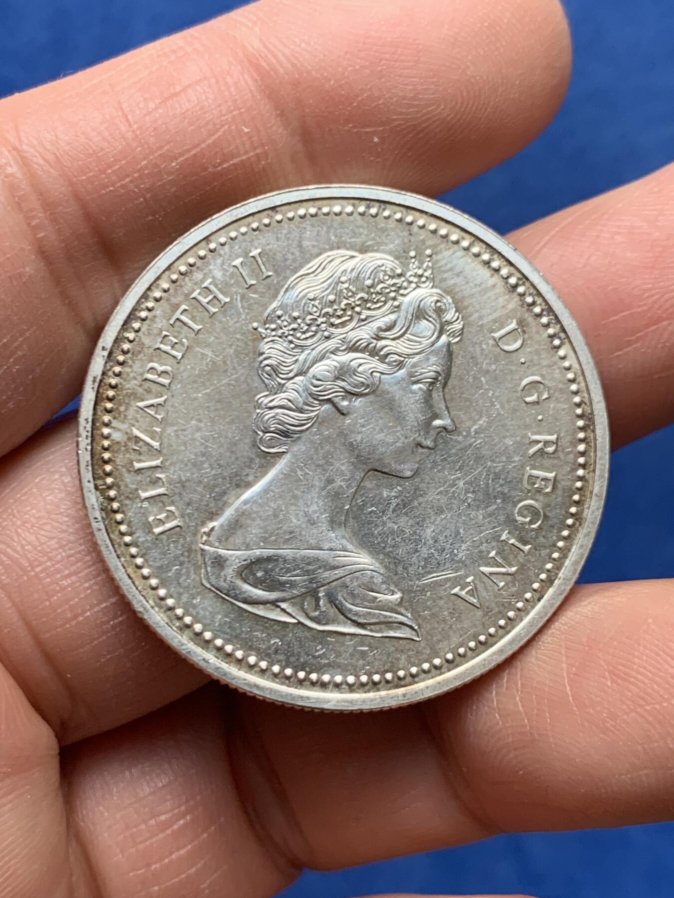 《竞宝斋》第460场 周日，周一，2场连拍 （全场包邮）欢迎送拍 加拿大1974年1元银币，温尼伯建市100周年纪念，23.26克，500银