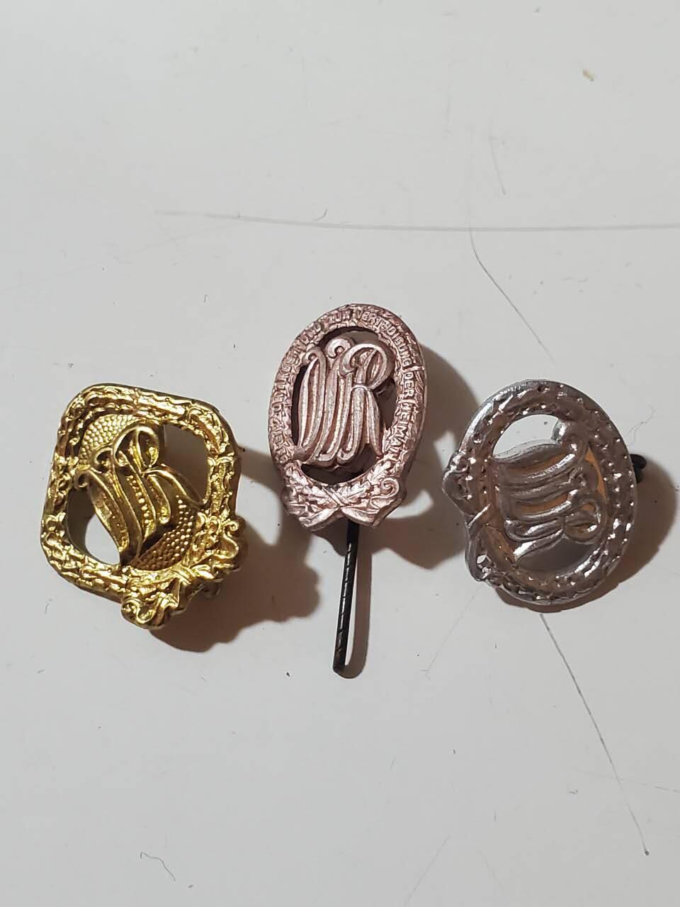 韵星假日拍卖第三十八期 -- Rimey Holidays Auction 38 民主德国金银铜体能证章一组