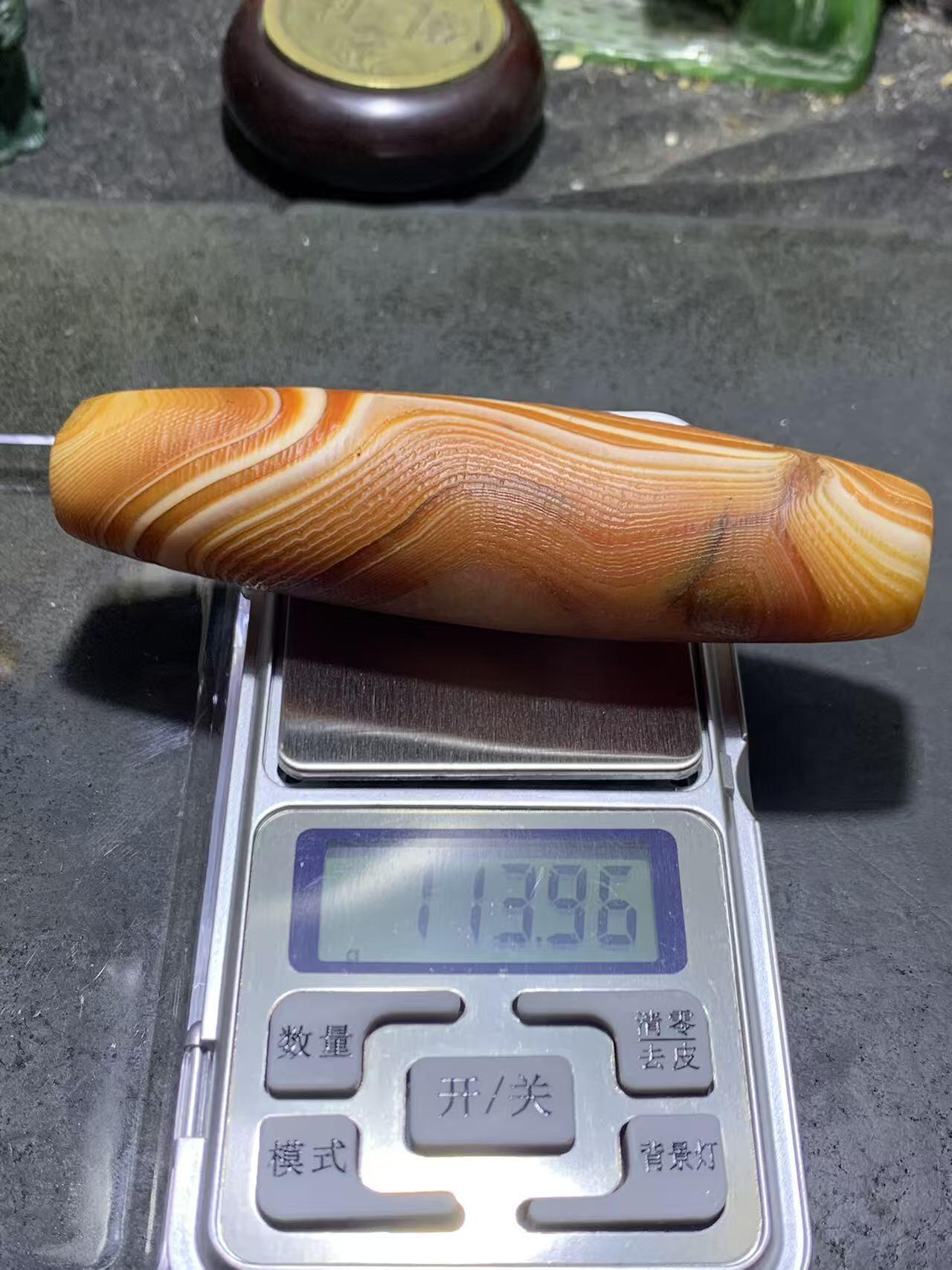 巨无霸天眼风化纹缠丝玛瑙大桶珠（把件)一颗