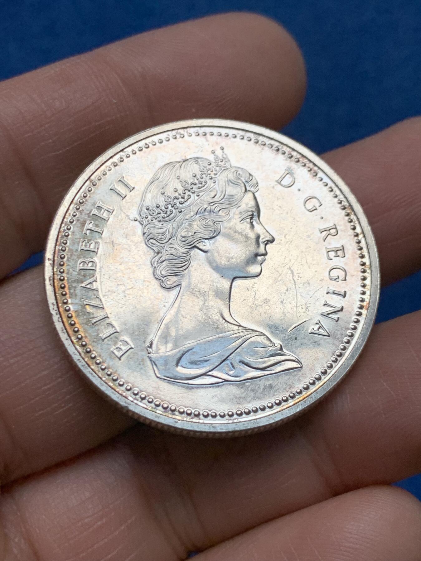 《竞宝斋》第460场 周日，周一，2场连拍 （全场包邮）欢迎送拍 加拿大1974年1元银币，温尼伯建市100周年纪念，23.26克，500银