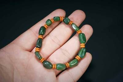 上海都达杂项专场四十八【全场包邮】  天然 和田玉碧玉随形糖珠手串 附鉴定证书86-82