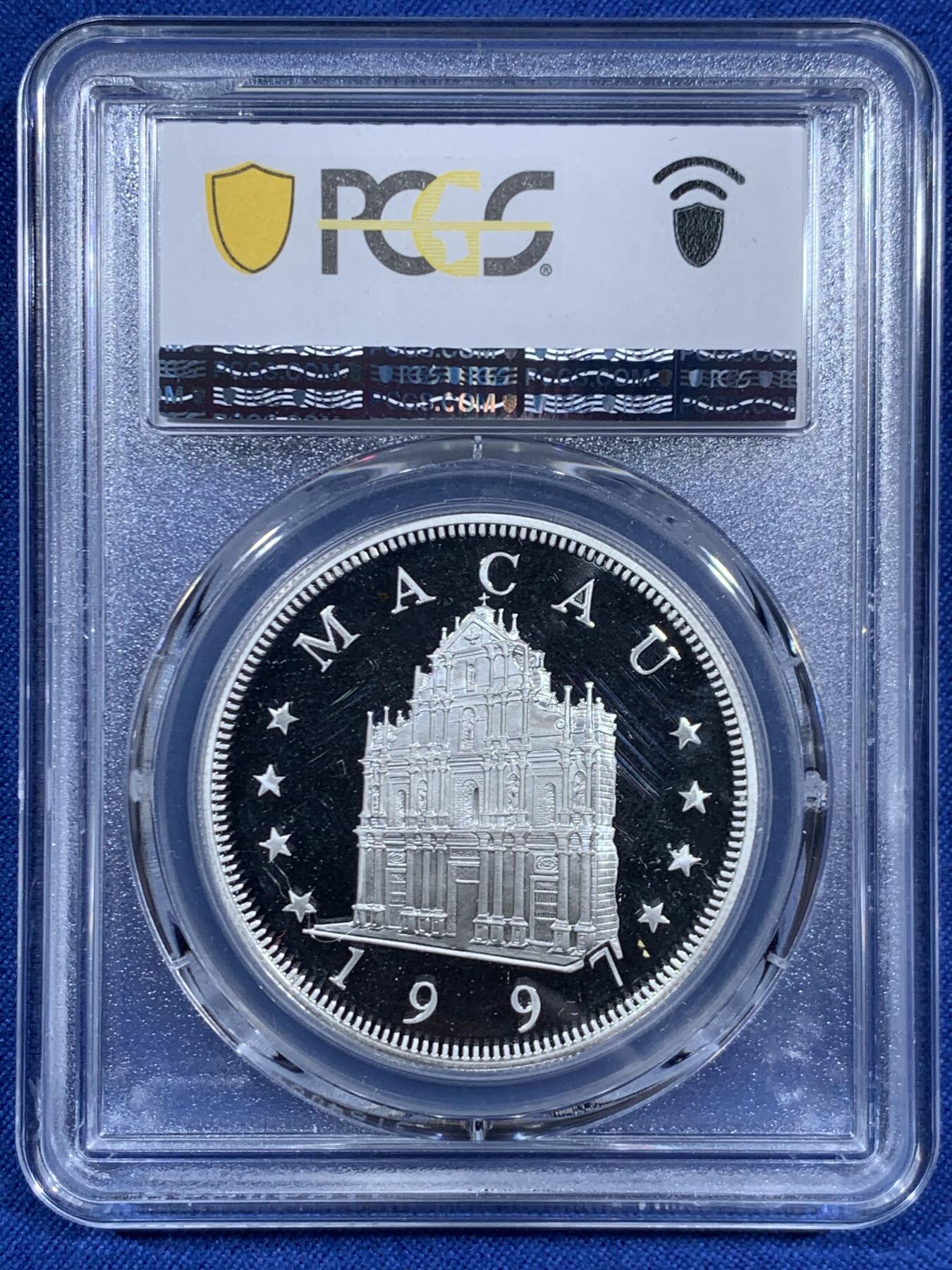 《竞宝斋》第460场 周日，周一，2场连拍 （全场包邮）欢迎送拍 PCGS PR68DCAM 1997年中国澳门牛年100元银币，PROOF精制币，状态极佳，背面支撑有磕。