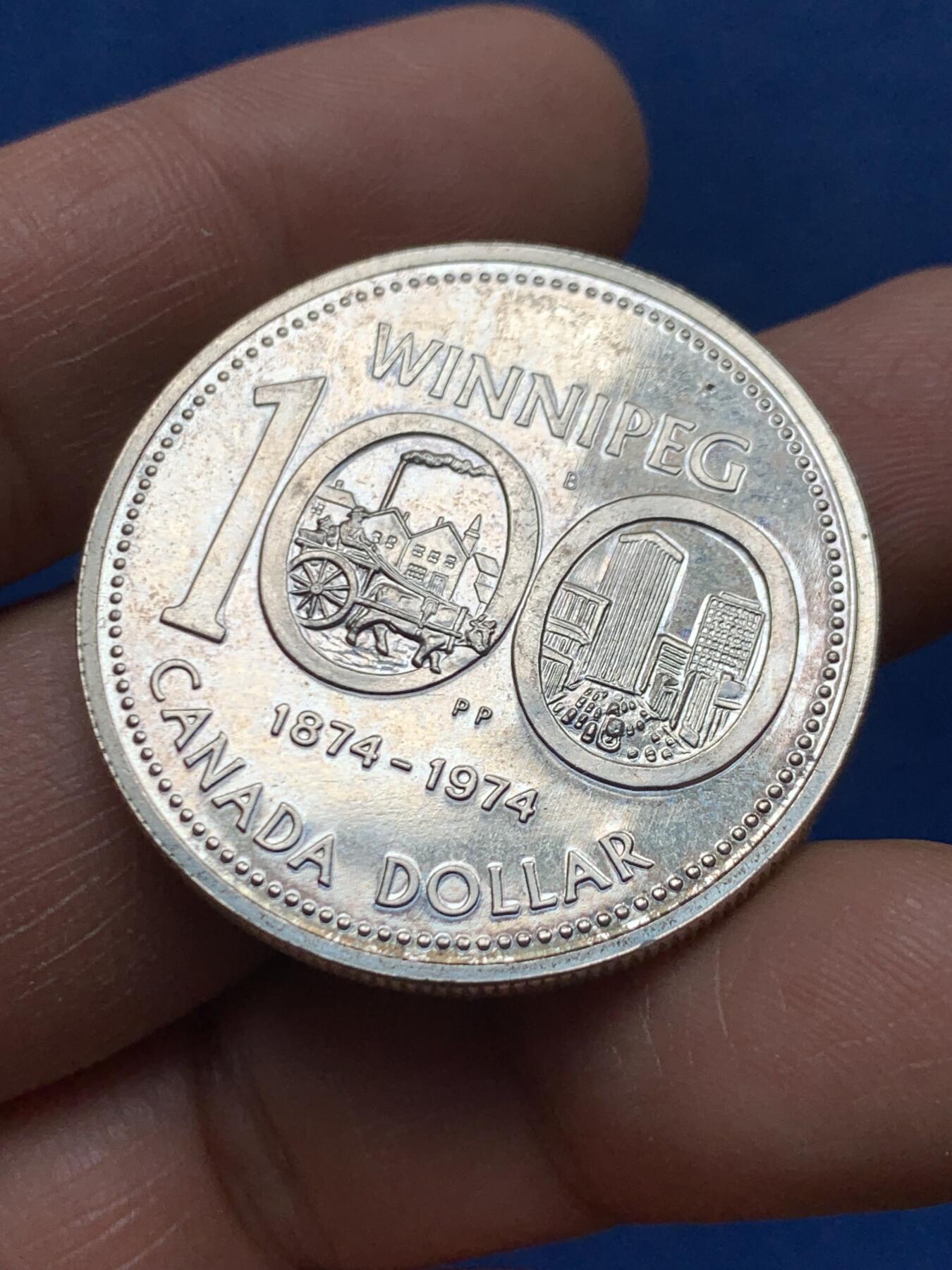 《竞宝斋》第460场 周日，周一，2场连拍 （全场包邮）欢迎送拍 加拿大1974年1元银币，温尼伯建市100周年纪念，23.26克，500银