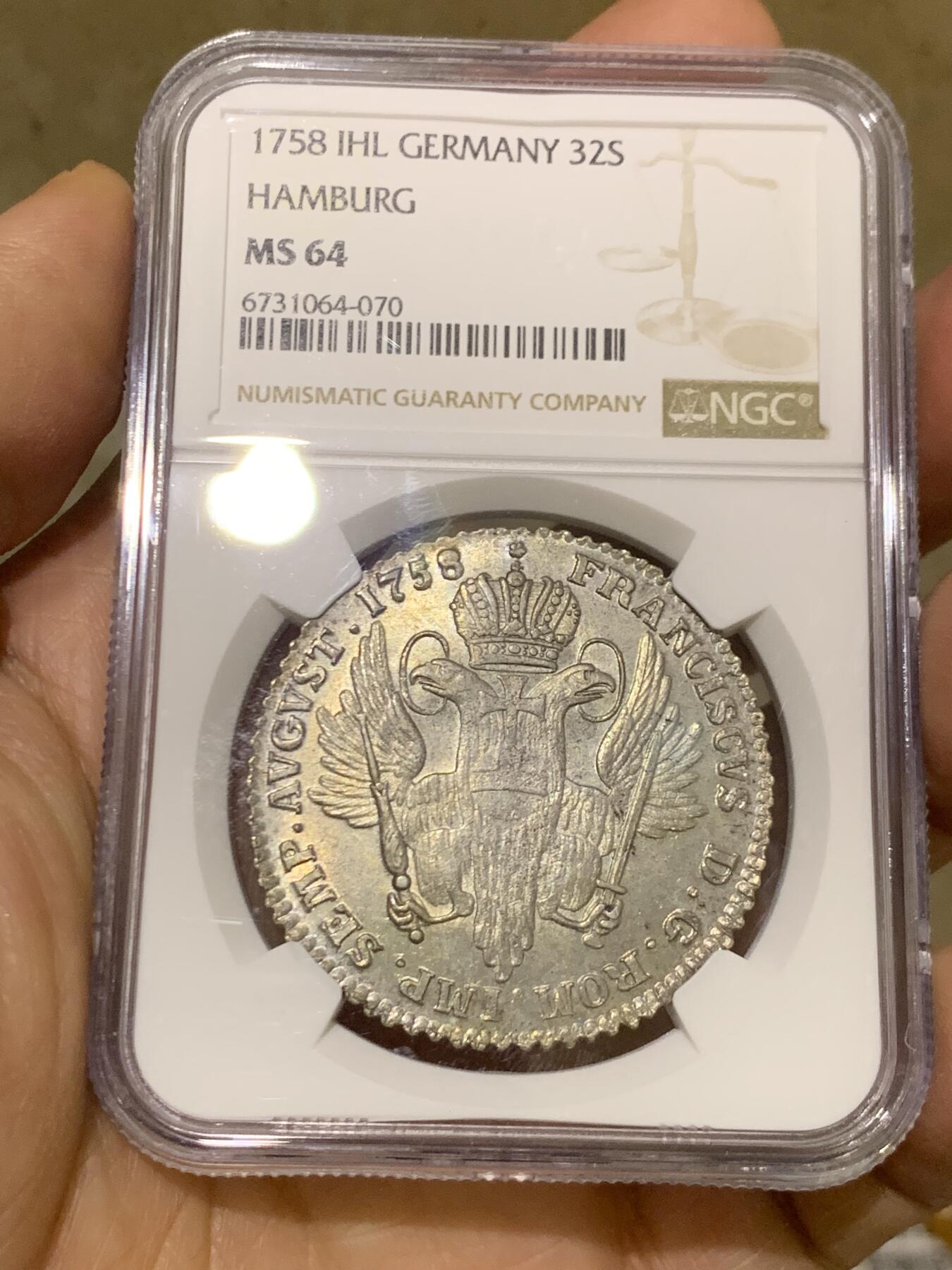 《竞宝斋》第460场 周日，周一，2场连拍 （全场包邮）欢迎送拍 NGC MS64 冠军分 神圣罗马帝国汉堡自由市1758年双头鹰32先令大银币，少见神罗大银，灰彩皮蛋光。双头鹰+汉堡城市徽章，打铸优良，堪称半机制币的样板作。状态卓越，冠军品质