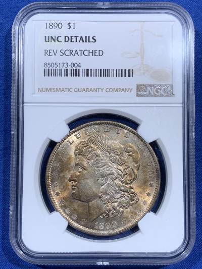 《竞宝斋》第460场 周日，周一，2场连拍 （全场包邮）欢迎送拍 - NGC UNC 美国1890年摩根银币，淡金彩，略少见的年份。