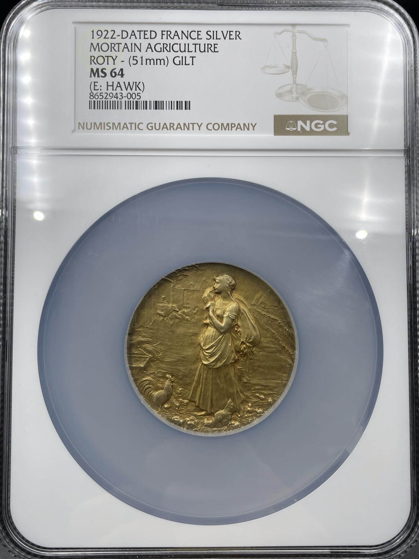 「木头集藏」章牌精品专场！ O.Roty～1922年法国莫尔坦农业展会镀金银章，MS 64，直径：51 mm，64.6 g，品相很好！ 莫尔坦（Mortain）是法国诺曼底大区的一座古城，以农业和畜牧业为经济支柱