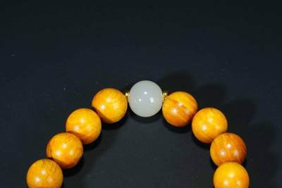 上海都达杂项专场七十三【全场包邮】 天然金丝楠木1.2圆珠手串 附鉴定证书86-298