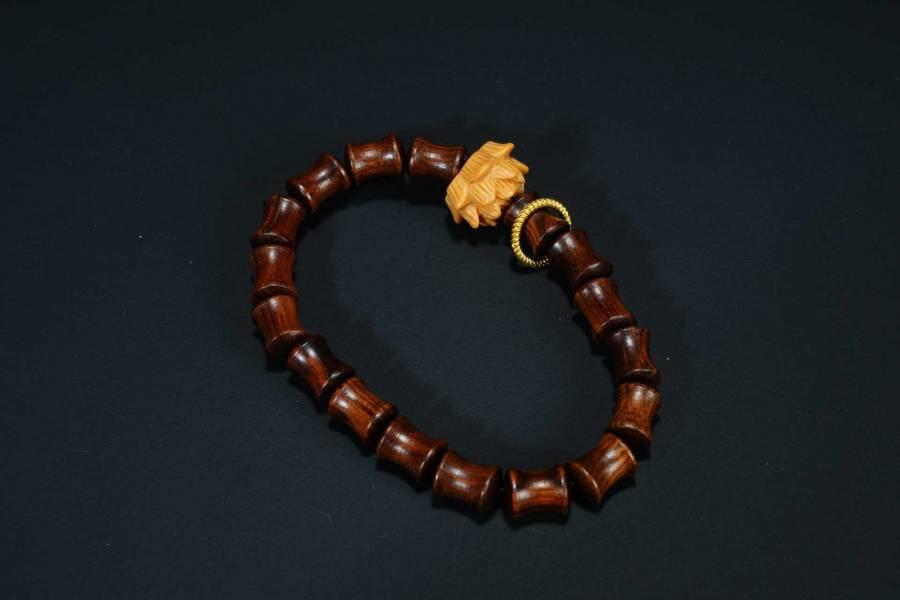 上海都达杂项专场四（全场包邮） 海南黄花梨虎皮纹竹节珠莲花手串 附鉴定证书86-267