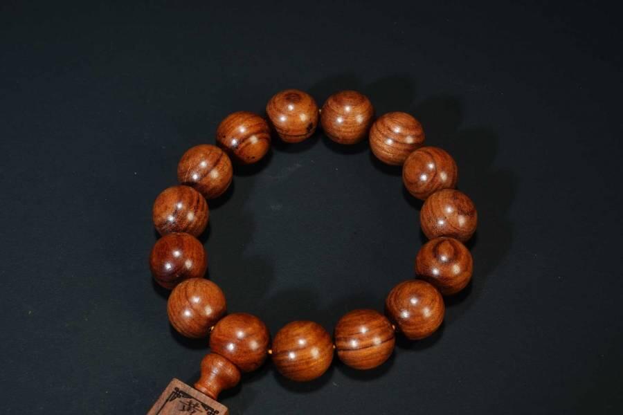 上海都达杂项专场四（全场包邮） 海南黄花梨虎皮纹1.5圆珠手串 附鉴定证书86-257