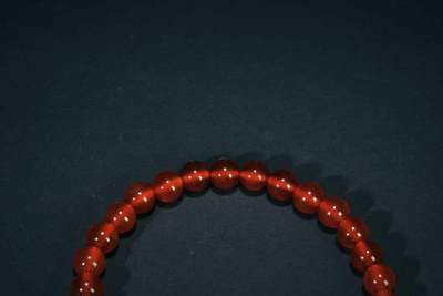 上海都达杂项专场三十四【年后发货全场包邮】  天然红玛瑙0.6圆珠手串 附鉴定证书86-327