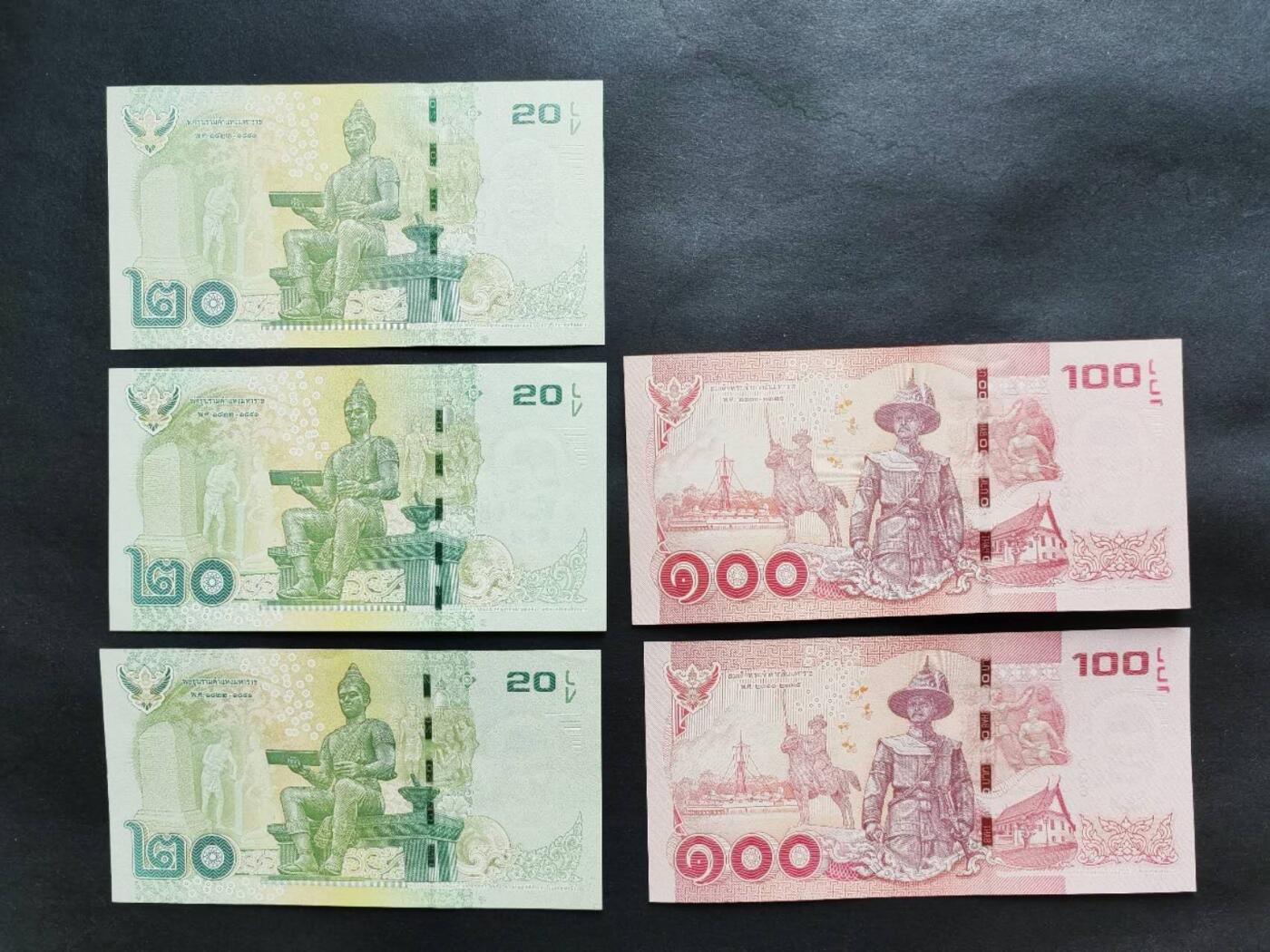 外国纸币专场260124场 泰国🇹🇭20铢和100铢五张，含多张豹子号，多个不同签名，全新品相UNC。泰国现己换版。