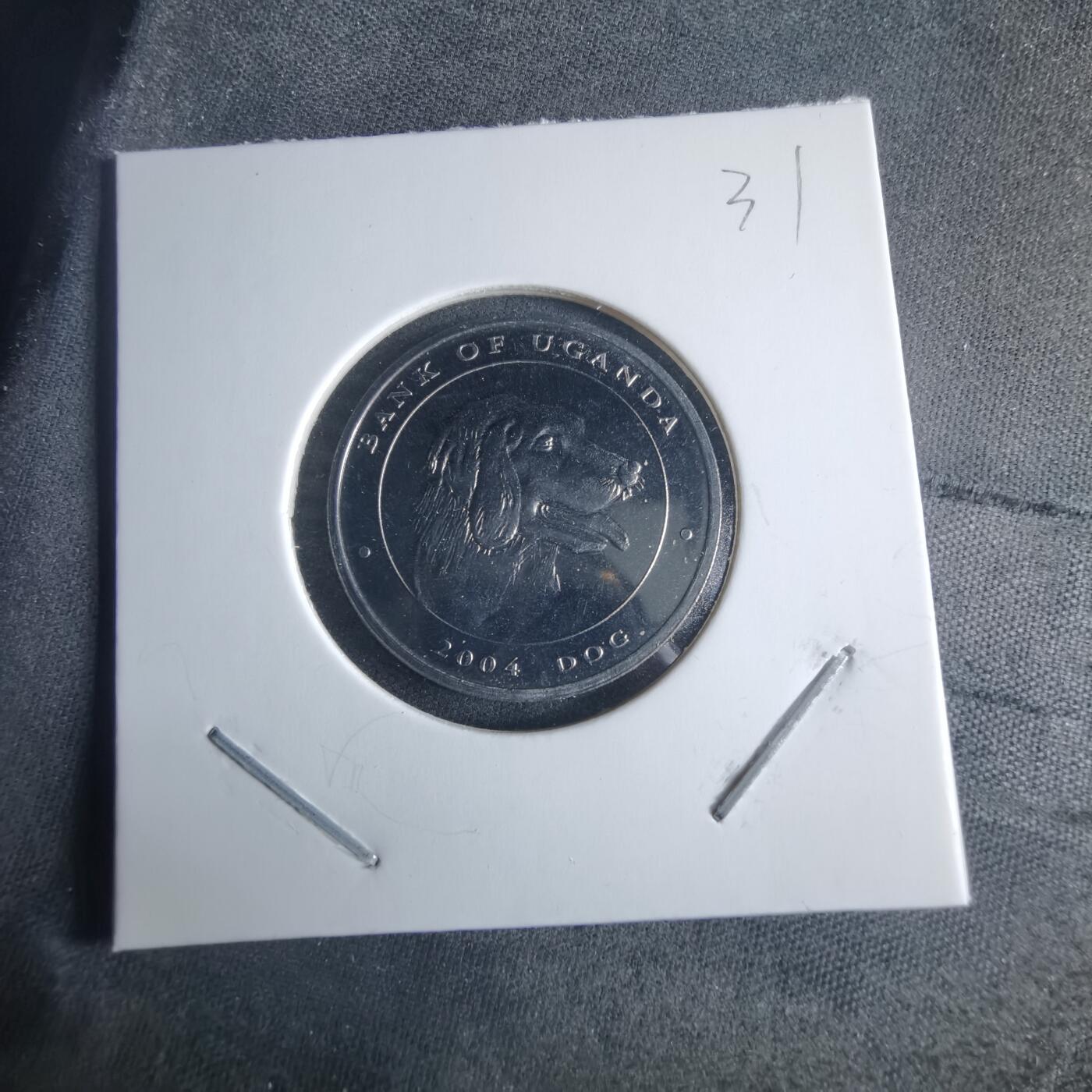 沼泽如烟--第970场 乌干达2004年100先令狗