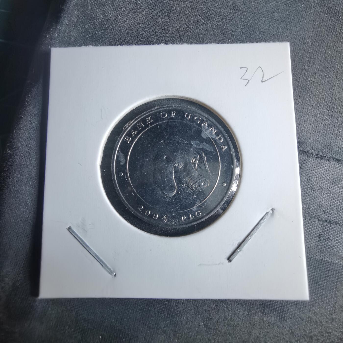 沼泽如烟--第970场 乌干达2004年100先令猪