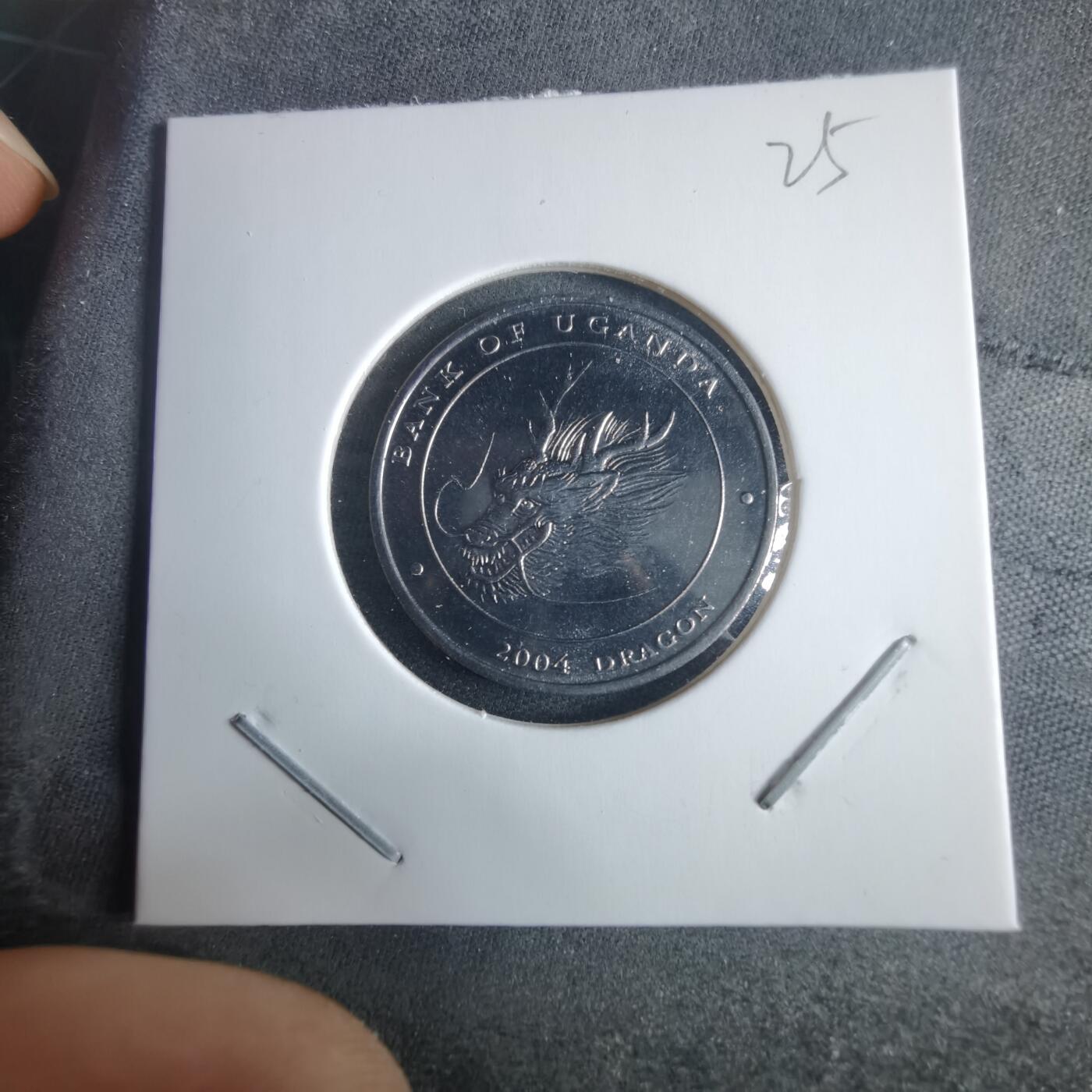 沼泽如烟--第970场 乌干达2004年100先令龙