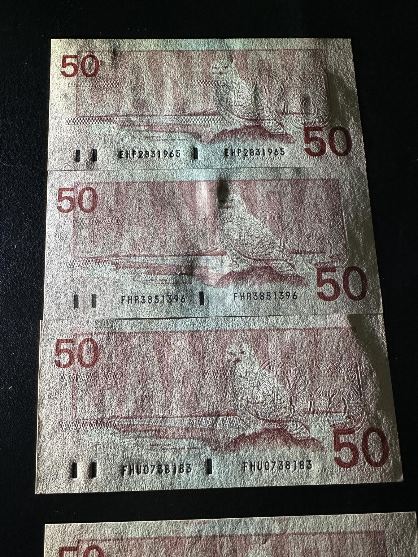 《外钞收藏家》第六百零四期（精品场）（本平台长期征集拍品、欢迎藏友们联系合作） 加拿大鸟版50加元 四张一起 四个签名 全新UNC 其中1张有压印 有2张有轻微潮点