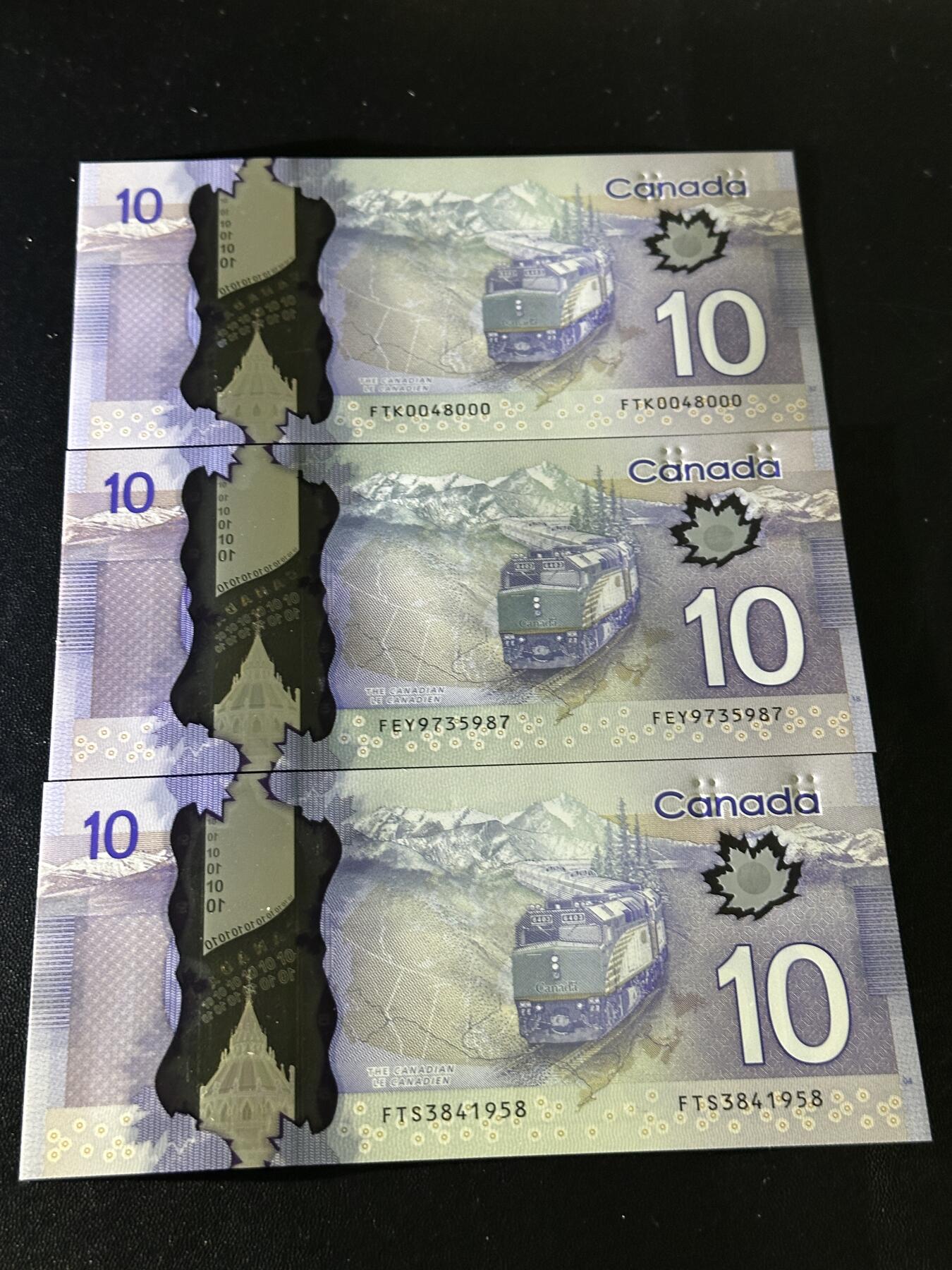 《外钞收藏家》第六百零四期（精品场）（本平台长期征集拍品、欢迎藏友们联系合作） 加拿大10加元 三张一起 三个签名 全新UNC 其中1张豹子号000