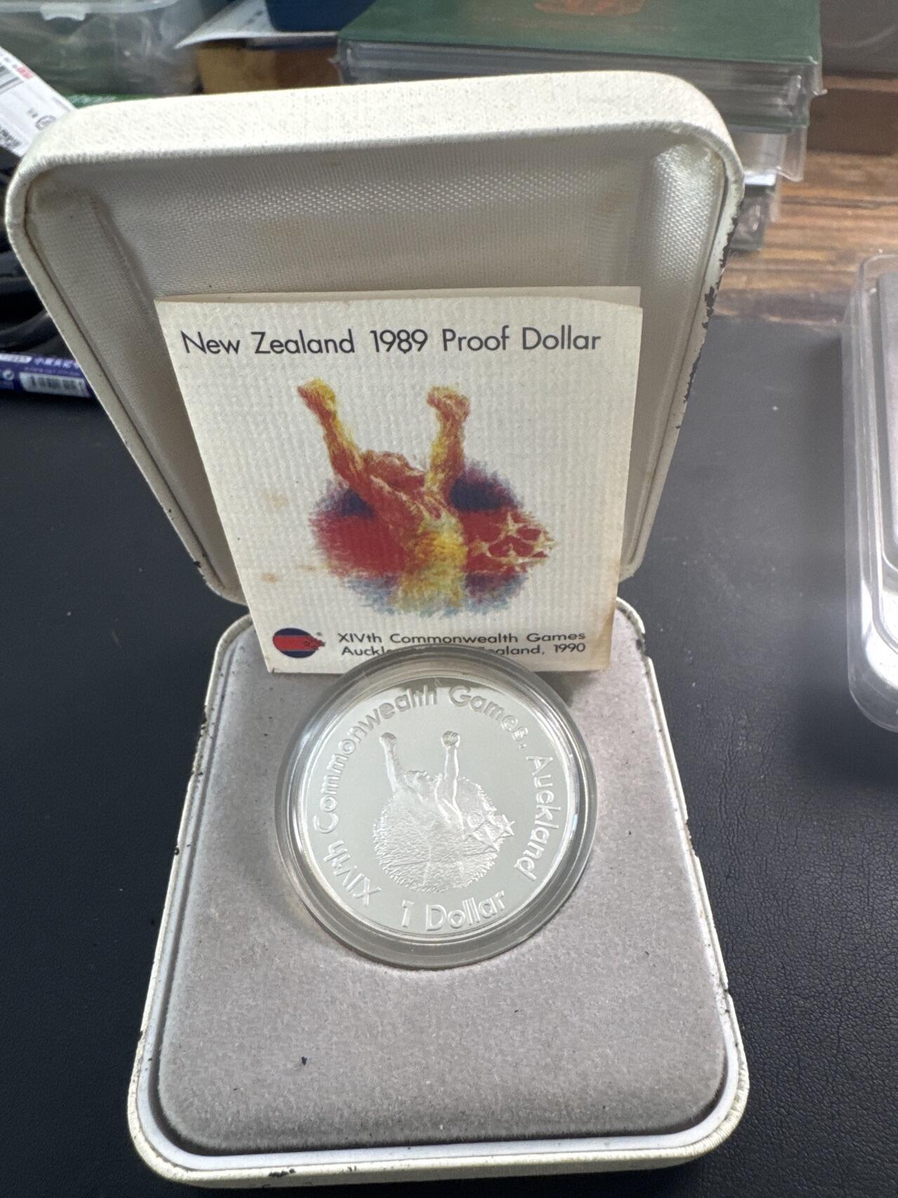 ❤️【币观天下】❤️ 第340期钱币拍卖- 2026.1.23周五晚上6点半场-长期征集拍品 新西兰1989年英联邦运动会1元精制纪念银币27.216克