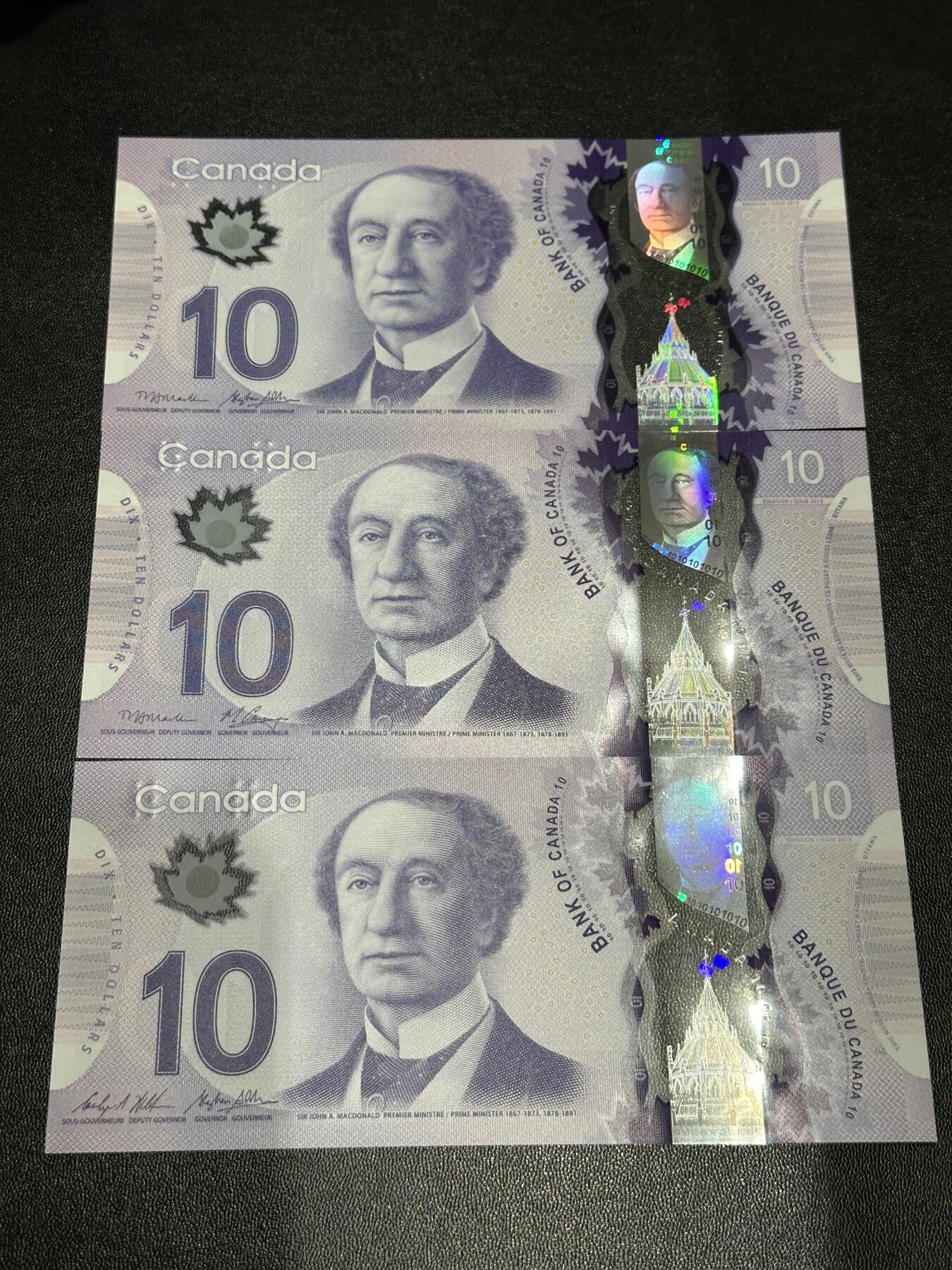 《外钞收藏家》第六百零四期（精品场）（本平台长期征集拍品、欢迎藏友们联系合作） 加拿大10加元 三张一起 三个签名 全新UNC 其中1张豹子号000