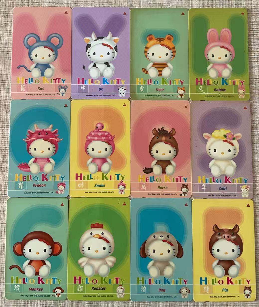 《卡拍》第343期拍卖1月24日晚22：10时延时截拍 新加坡GPT卡《Hello kitty版十二生肖》十二全旧卡，虎、羊两枚使用痕迹较明显，边缘部分泛黄。