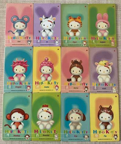 《卡拍》第343期拍卖1月24日晚22：10时延时截拍 - 新加坡GPT卡《Hello kitty版十二生肖》十二全旧卡，虎、羊两枚使用痕迹较明显，边缘部分泛黄。