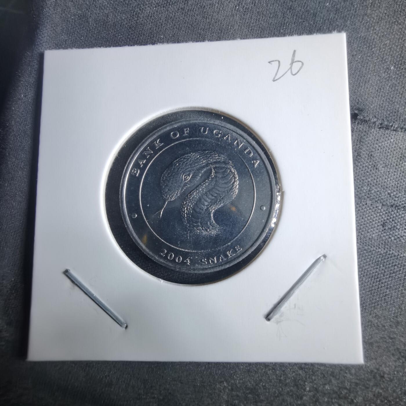 沼泽如烟--第970场 乌干达2004年100先令蛇