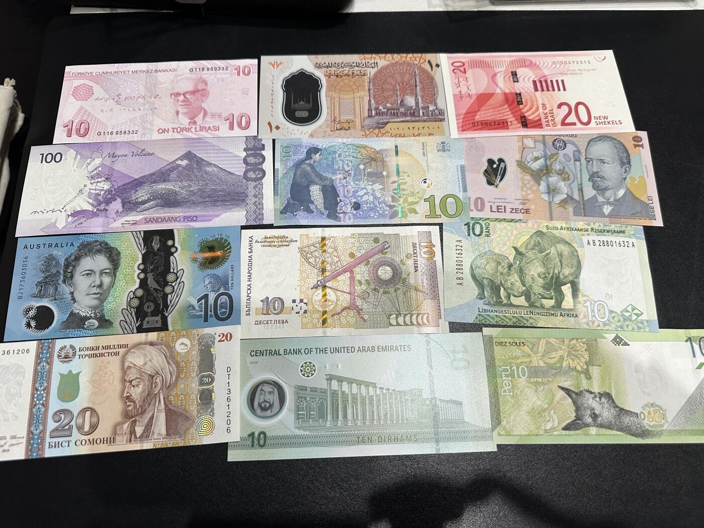 《外钞收藏家》第六百零四期（精品场）（本平台长期征集拍品、欢迎藏友们联系合作） 澳大利亚、菲律宾、以色列等精美小钞 12张一起 全新UNC