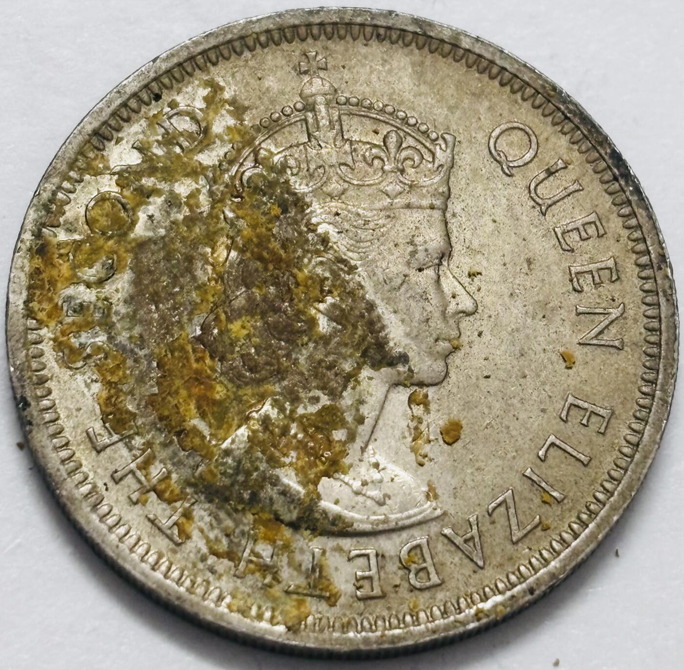 文馨钱币收藏 2026新年第四场（第 290 场）【长期接代拍品】 特年  1973 年英属香港大一元，有纸屑，用清水扒拉一下即可