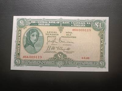 2026一月第四期，总214期 - 爱尔兰1949年1镑UNC-千位倒置号9119，早期下方有英爱两国货币互换协议的版本，爱尔兰人格化象征“拉维利夫人”