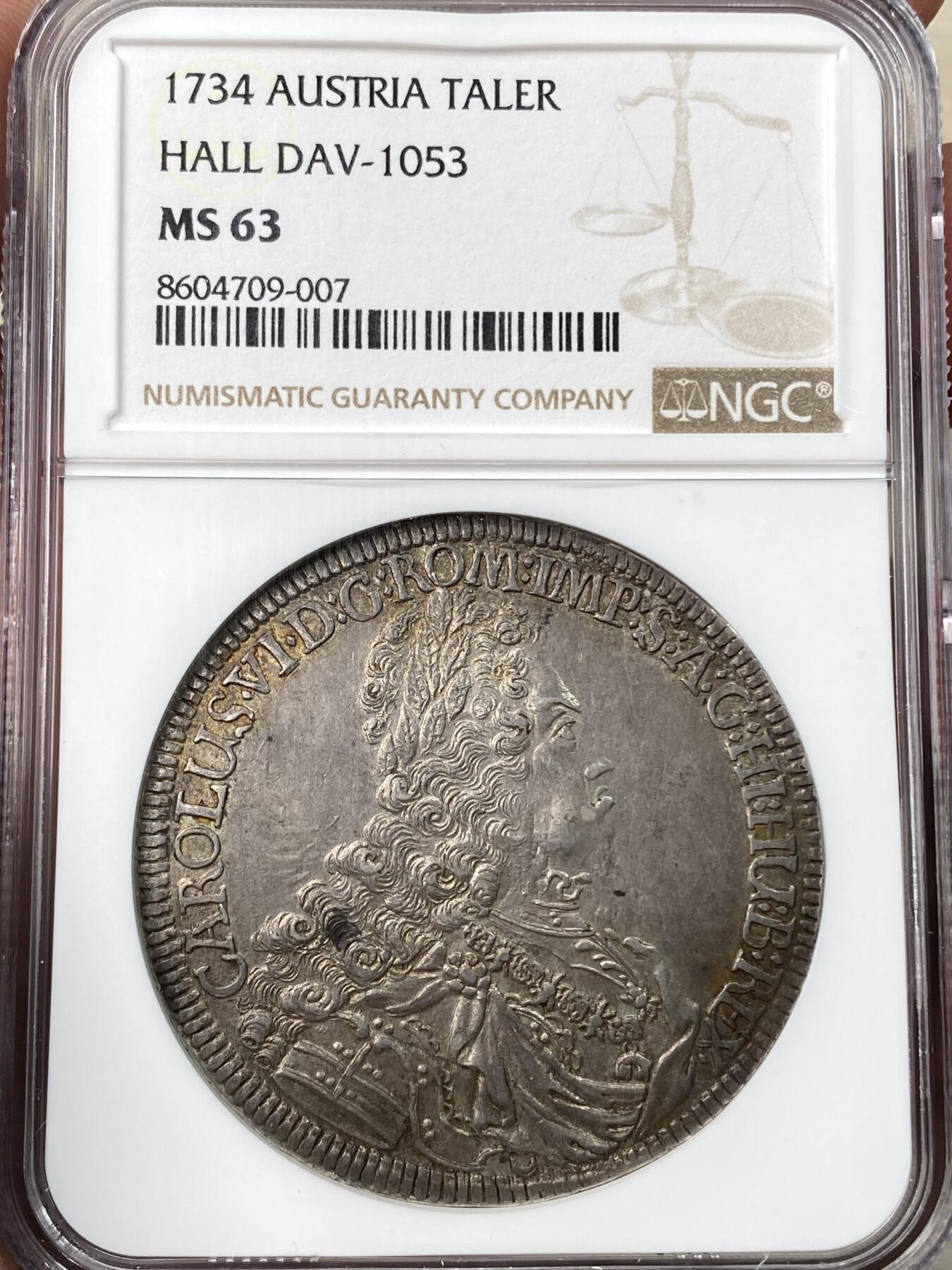 万国钱币拍卖第059期 NGC MS63 1734年神圣罗马帝国皇帝卡尔六世双头鹰大泰勒 哈尔厂铸造 神罗经典品种 双面均匀欧陆深五彩 细节锋利打制极佳 NGC唯一冠军分典藏级品质