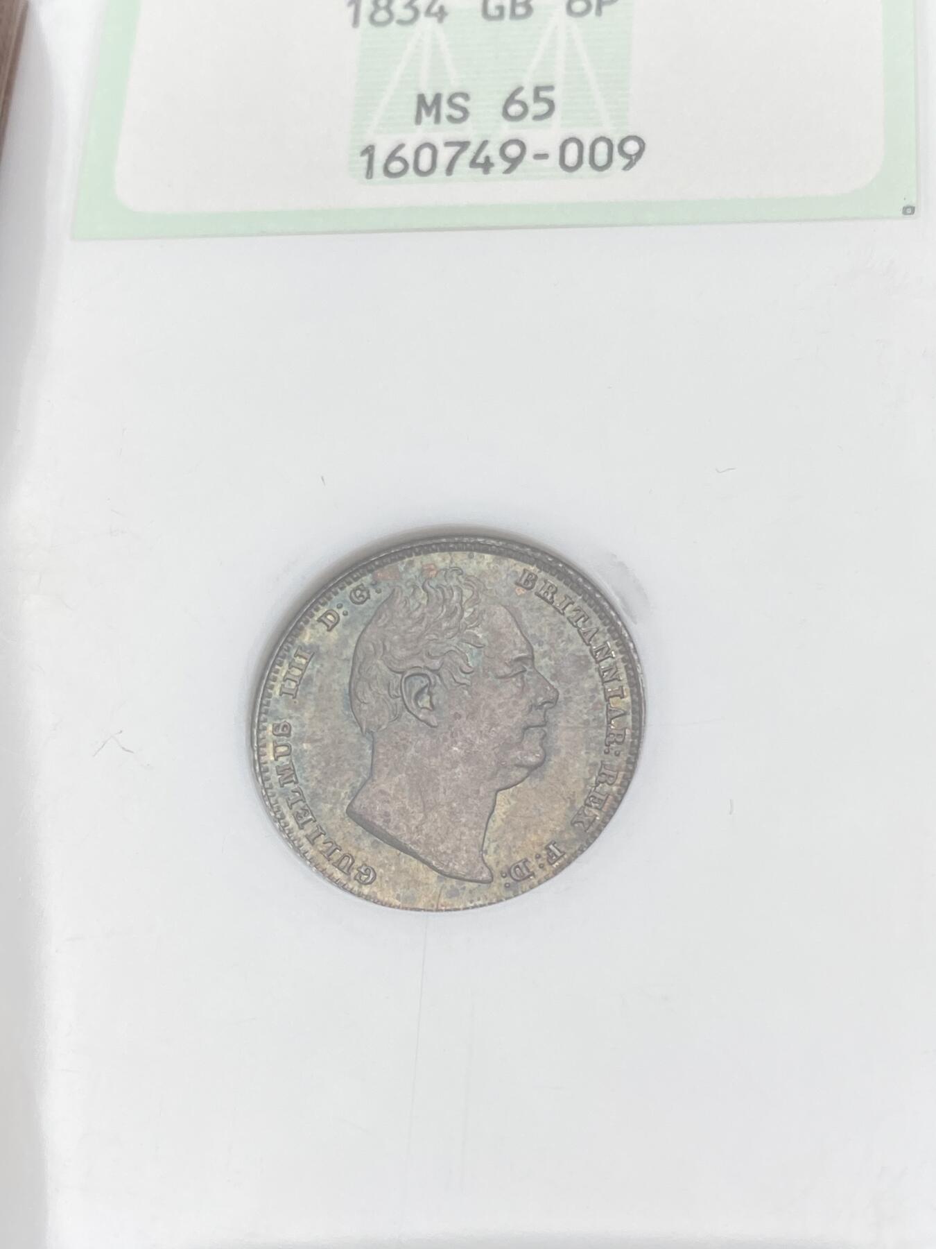 万国钱币拍卖第059期 NGC MS65 1834年英国威廉四世6便士银币 NGC古董绿盒搭配绝美天鹅绒绿彩包浆 无可挑剔的BU品质