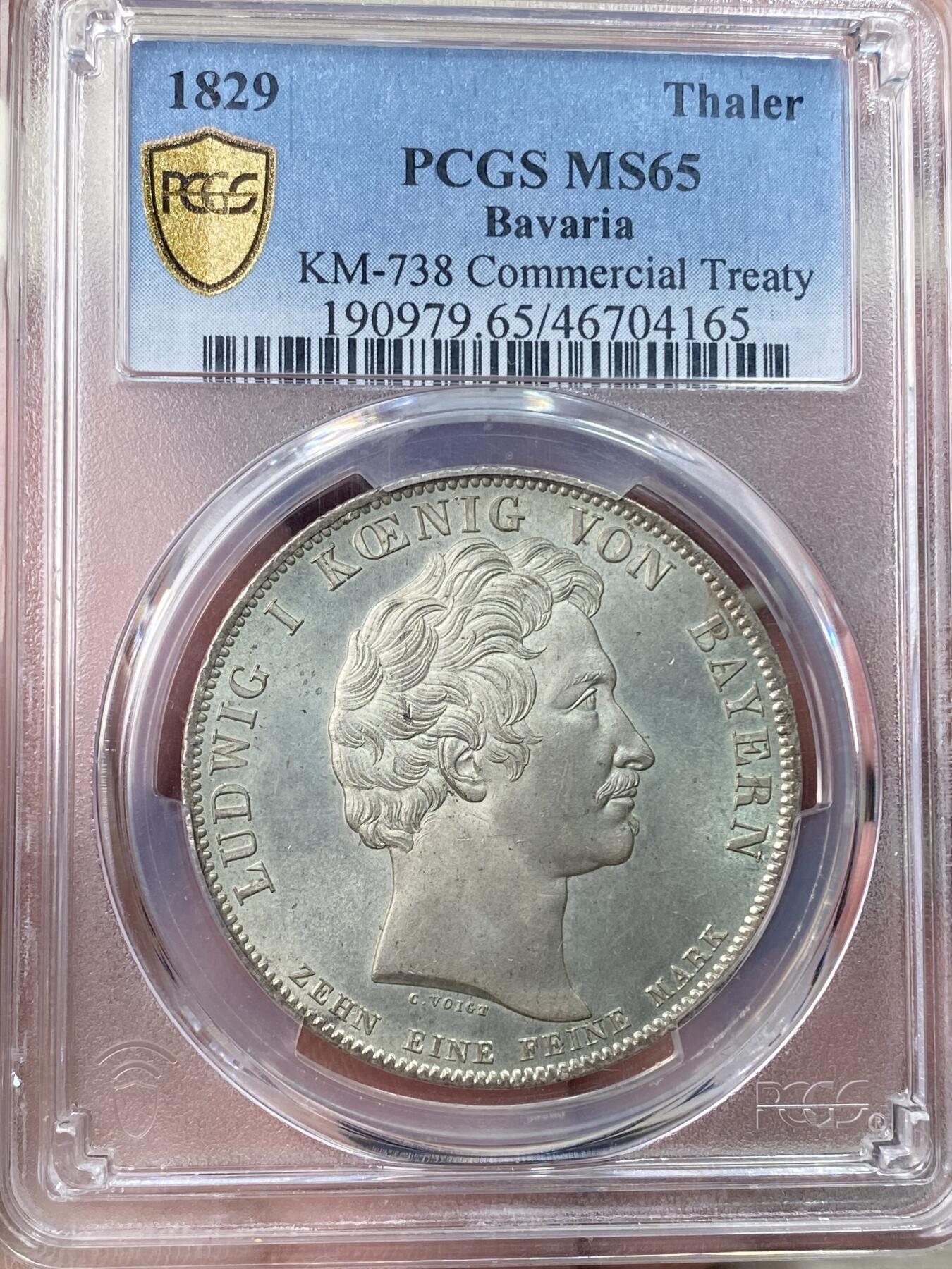 万国钱币拍卖第059期 PCGS MS65 1829年德国巴伐利亚路德维希一世贸易协定历史泰勒  纪念巴伐利亚、普鲁士、符腾堡和黑森之间的贸易协定泰勒 极其难得的BU级别历史大泰勒 银光在币面如流水般泻出  喷砂质感的四邦纹章紧密围绕在象征繁荣富裕的丰饶角周围 实物上手惊艳