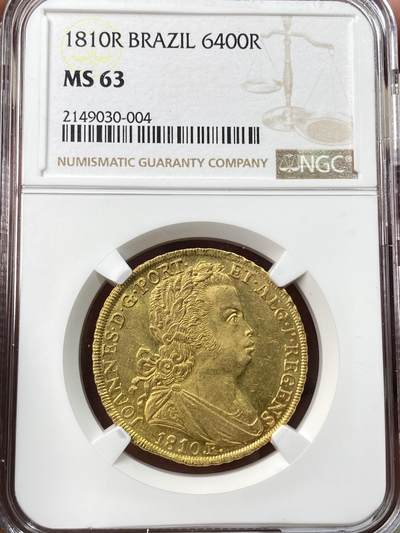 万国钱币拍卖第059期 - NGC MS63 1810年巴西摄政皇太子若昂六世6400瑞斯金币 里约热内卢造币厂铸 全深打金光迸发 黄金盾徽异常华丽 其规格等同于西班牙4埃斯库多 洼地品种 典藏级品质 14.34g