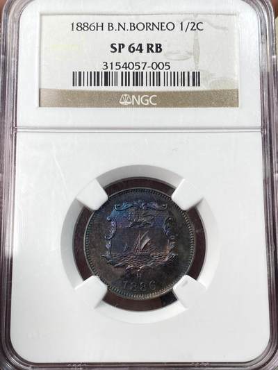 万国钱币拍卖第059期 - NGC SP64RB 1886英属北婆罗洲洋元半分铜币 SP工艺镜面质感绚丽五彩