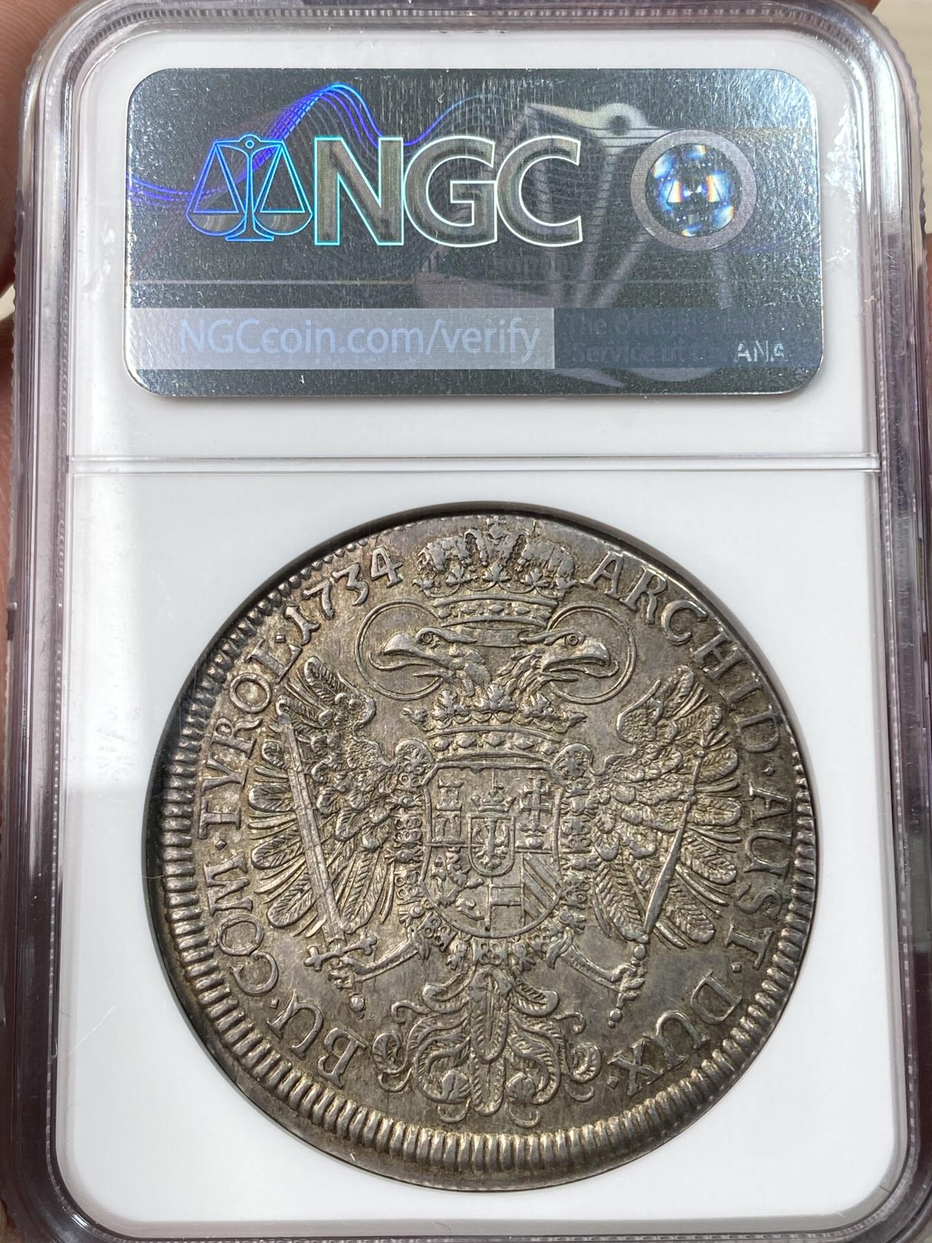 万国钱币拍卖第059期 NGC MS63 1734年神圣罗马帝国皇帝卡尔六世双头鹰大泰勒 哈尔厂铸造 神罗经典品种 双面均匀欧陆深五彩 细节锋利打制极佳 NGC唯一冠军分典藏级品质