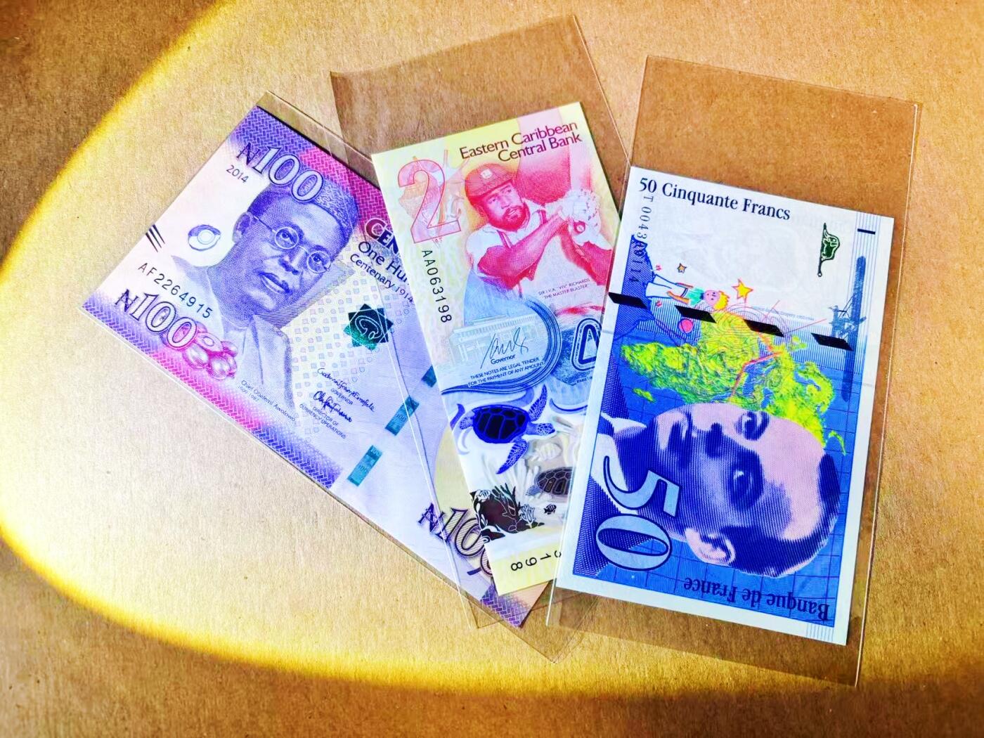 【Blue Auction】世界纸币精拍第778期——18级TOP拍卖/信誉/品质/专业/高效💫 【一组3张 含AA冠获奖钞无47】东加勒比 2024年2元&法国 1992年首年50法郎小王子&尼日利亚 2014年100奈拉 全新UNC