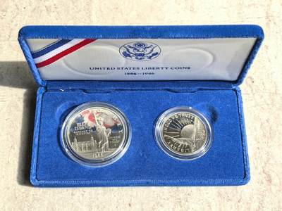 博洋堂世界钱币拍卖第158期（全场包邮） - 1986年美国1美元和半美元精制银镍套 自由女神（1美元精制银币，半美元精制铜镍币） 盒证全