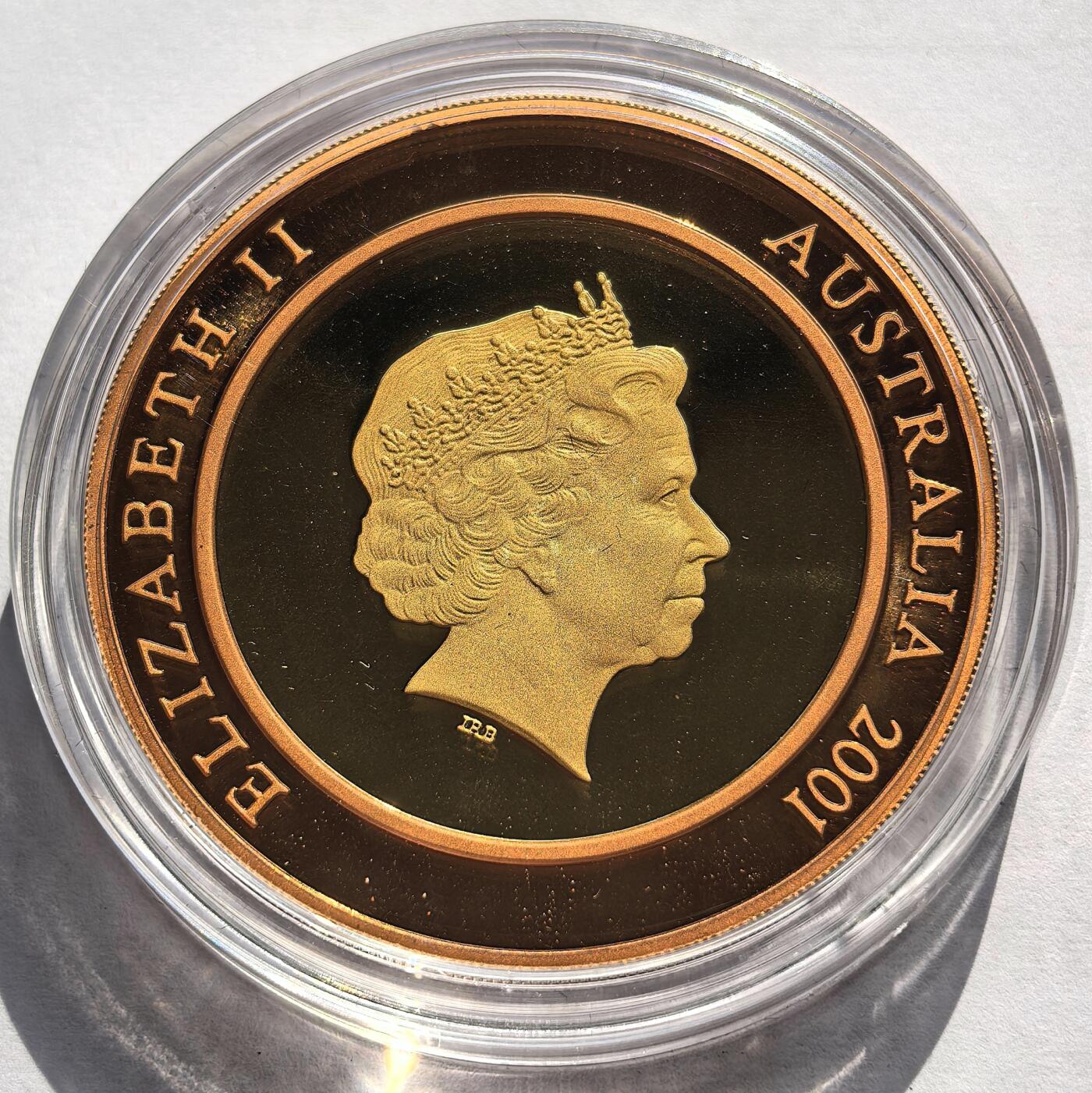 博洋堂世界钱币拍卖第158期（全场包邮） 2001年澳大利亚10元铜银双金属币 千禧系列-未来 外圈999%铜 中心999%银镀24K金 33.15克 盒证全 发行量：2万