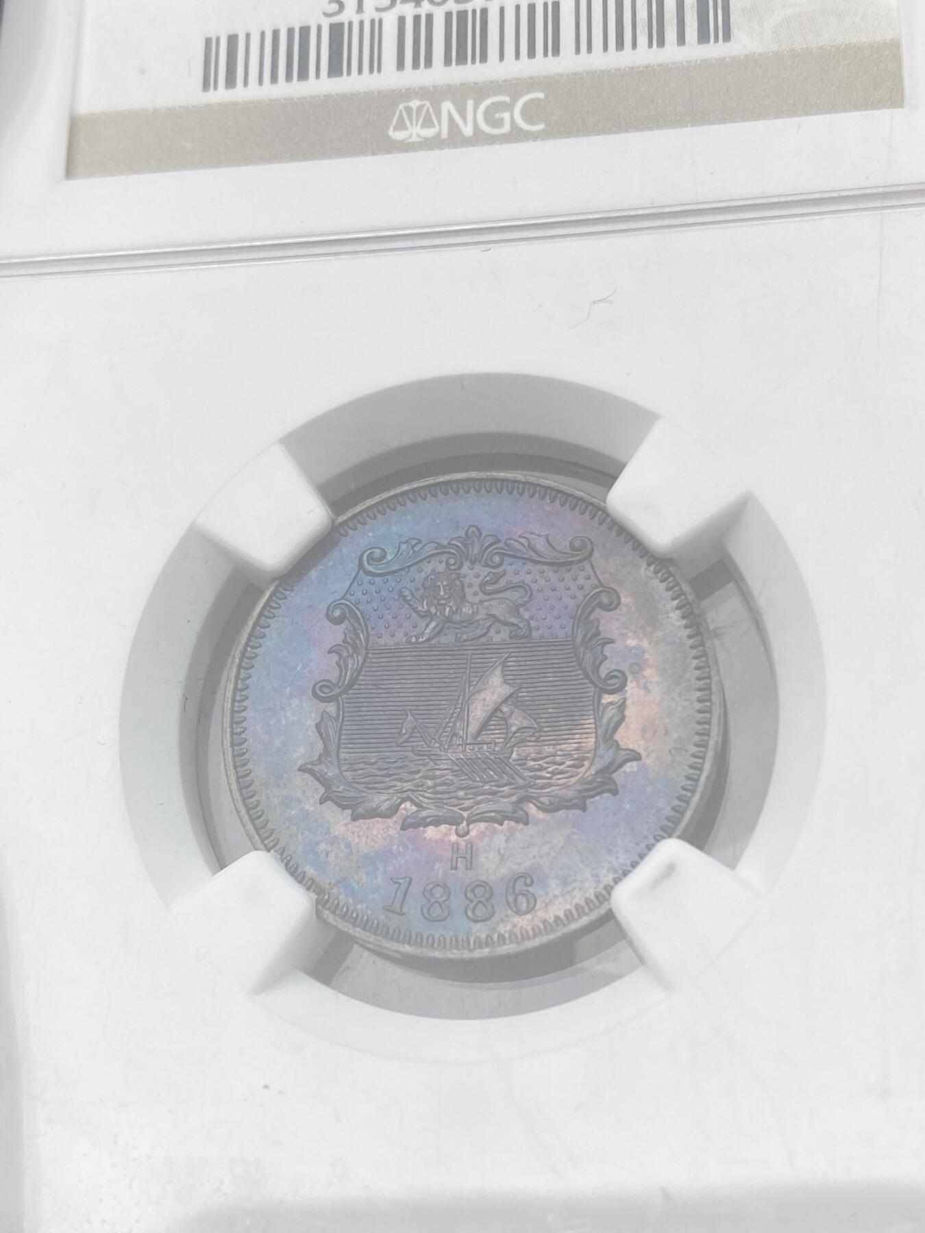 万国钱币拍卖第059期 NGC SP64RB 1886英属北婆罗洲洋元半分铜币 SP工艺镜面质感绚丽五彩