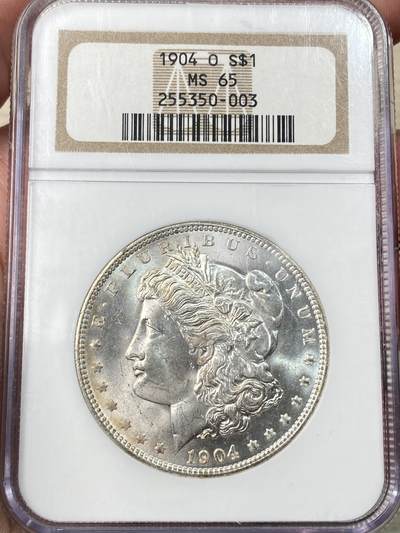万国钱币拍卖第059期 - NGC MS65 1904年O版美国摩根一美元大银 原味深五彩NGC经典老盒BU收藏级