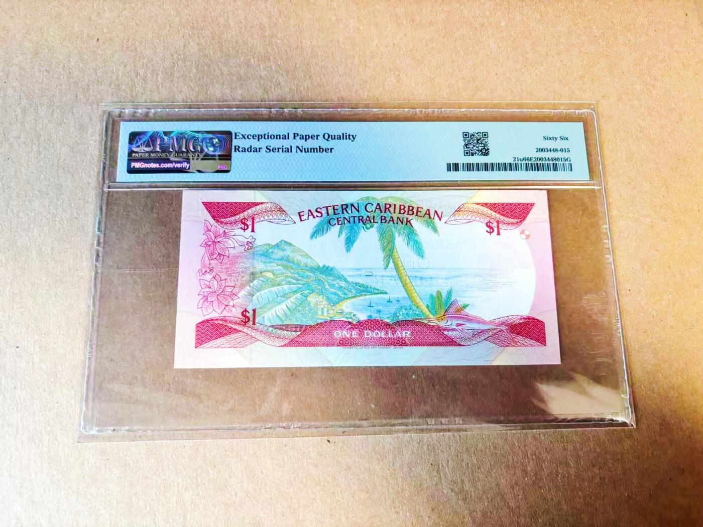 【Blue Auction】世界纸币精拍第778期——18级TOP拍卖/信誉/品质/专业/高效💫 【雷达号】东加勒比 1988-89年1元 小彩背 女王  PMG66EPQ 