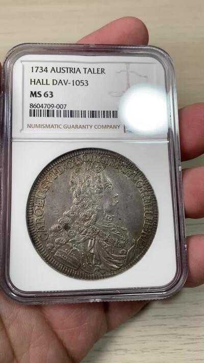 万国钱币拍卖第059期 NGC MS63 1734年神圣罗马帝国皇帝卡尔六世双头鹰大泰勒 哈尔厂铸造 神罗经典品种 双面均匀欧陆深五彩 细节锋利打制极佳 NGC唯一冠军分典藏级品质