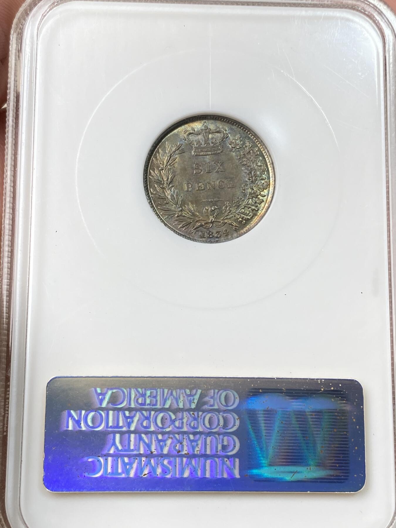 万国钱币拍卖第059期 NGC MS65 1834年英国威廉四世6便士银币 NGC古董绿盒搭配绝美天鹅绒绿彩包浆 无可挑剔的BU品质