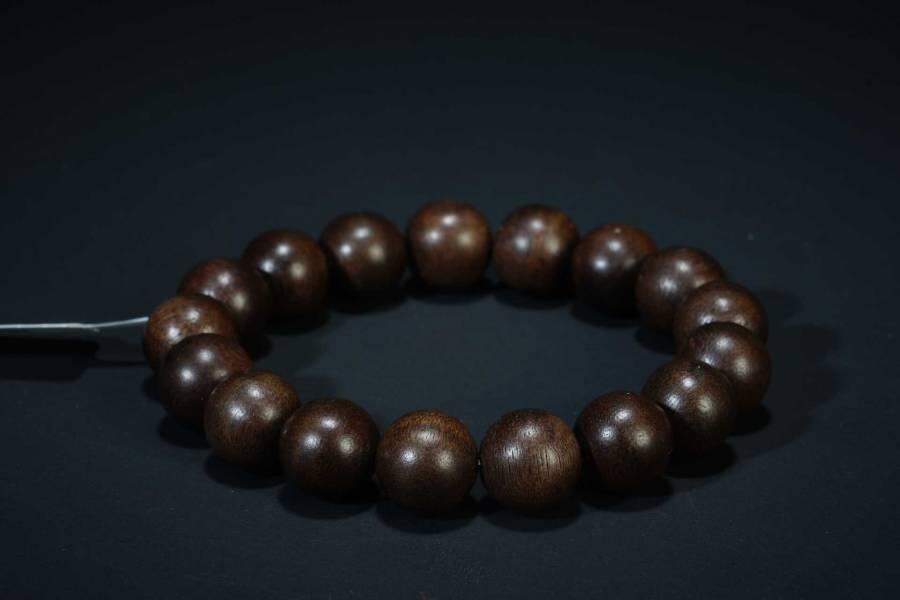 上海都达杂项专场二十五（全场包邮）  天然文莱软丝沉香1.2圆珠手串 附鉴定证书87-214